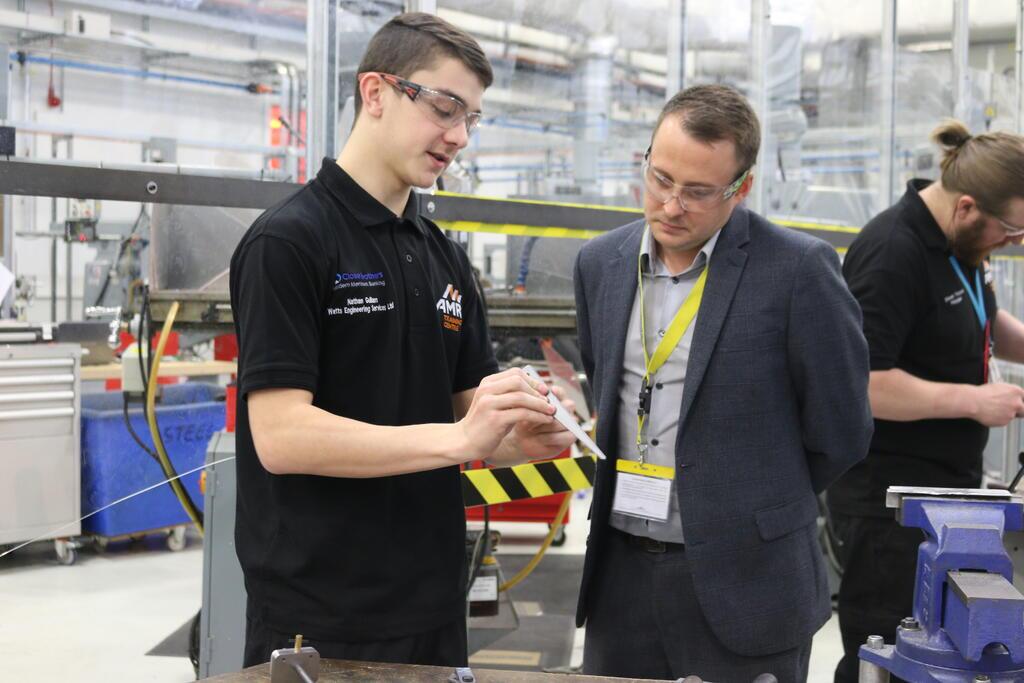 New skills: Close Brothers’ area sales manager Ben Coldwell with Nathan Guilliam, apprentice with Watts Engineering Services Ltd on the AMRC Training Centre shop floor. 