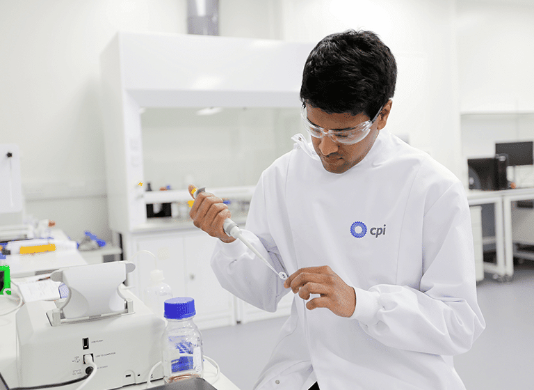 CPI engineer using health testing equipment