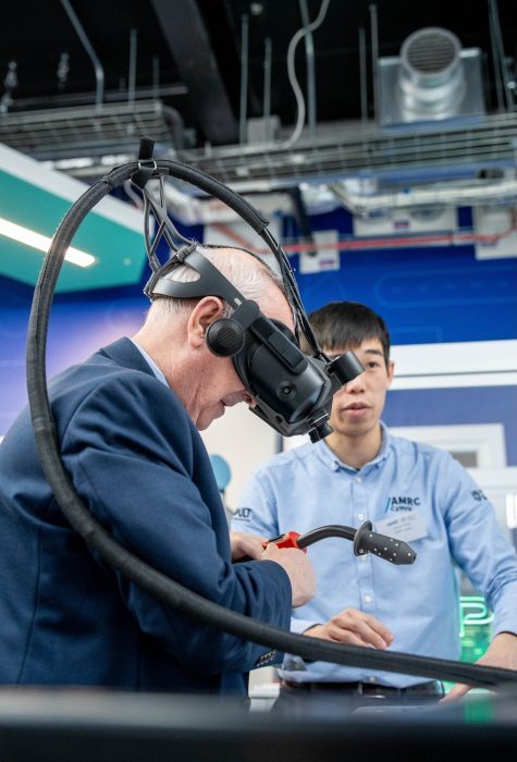 Two people using a virtual reality headset